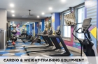Cardio and weight-training equipment at Eight West Third Apartments