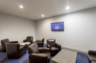 One of the social lounges with large screen cable televisions