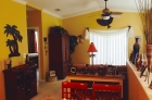 Living and dining area filled with abundant natural light