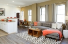 Hardwood flooring carries through common spaces