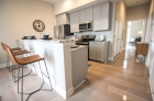 Open concept kitchen and hallway to the bedroom 