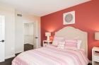 Bedroom with walk-in closet