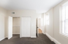 Bedroom with wall to wall carpeting