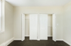 Bedroom with dual closets