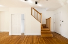 Common areas featuring gleaming hardwood floors