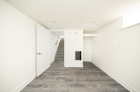 Dark floor bedroom contrasting white walls