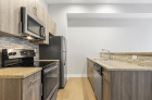 Steel appliances and granite countertops at 1300 Chestnut Street kitchen