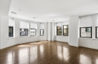 Spacious living areas featuring wooden floor