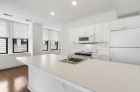 Kitchen island with sink at The Burnley