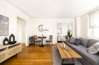 Living room with abundant windows and natural light