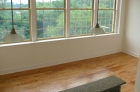 dining space with hardwood flooring