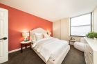 Kensington Court bedroom with wall-to-wall carpeting