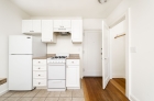 Kitchen area with storage closet