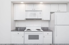 White kitchen cabinets and appliances 