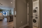 Stackable washer and dryer in a utility closet